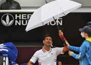 Novak Djokovic loses cool, wins match against Taylor Fritz in Rome rain
